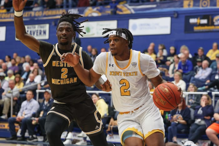Kent State guard Malique Jacobs drives around Western Michigan guard Tray Maddox Jr. during the first half of an NCAA basketball game against the Western Michigan Broncos, Tuesday, Jan. 3, 2023 at the Kent State M.A.C. Center.